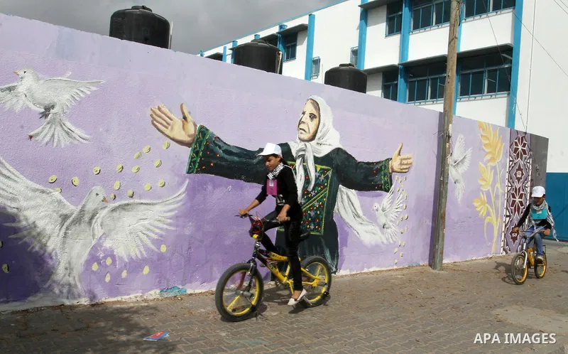 Palestinian children take part in the bicycles marathon to demand their right to play and break the siege on Gaza strip, in Rafah in the southern Gaza Strip. on August 7, 2016. Photo by Abed Rahim Khatib