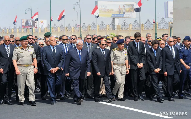 Egyptian President Abdel Fattah al-Sisi walks during a military funeral ceremony with Egyptian government officials and relatives of Egyptian-American Ahmed Zewail world's Nobel Prize in chemistry, who died last Tuesday...