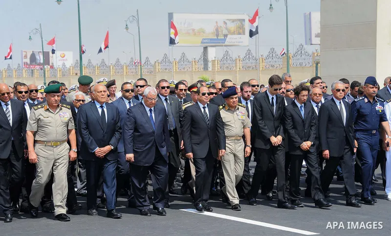 Egyptian President Abdel Fattah al-Sisi walks during a military funeral ceremony with Egyptian government officials and relatives of Egyptian-American Ahmed Zewail world's Nobel Prize in chemistry, who died last Tuesday...