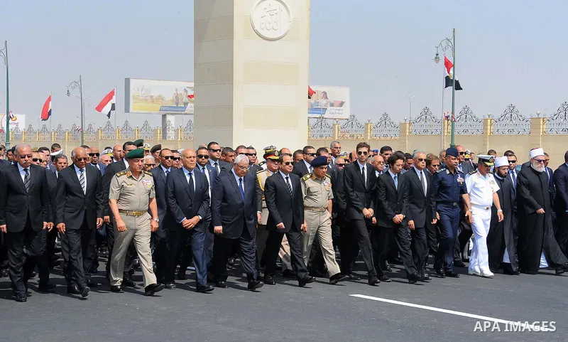 Egyptian President Abdel Fattah al-Sisi walks during a military funeral ceremony with Egyptian government officials and relatives of Egyptian-American Ahmed Zewail world's Nobel Prize in chemistry, who died last Tuesday...