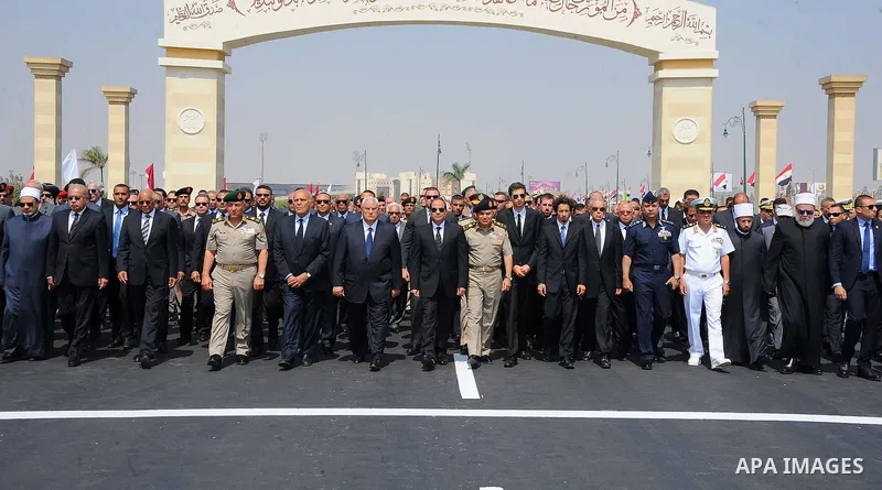 Egyptian President Abdel Fattah al-Sisi walks during a military funeral ceremony with Egyptian government officials and relatives of Egyptian-American Ahmed Zewail world's Nobel Prize in chemistry, who died last Tuesday...