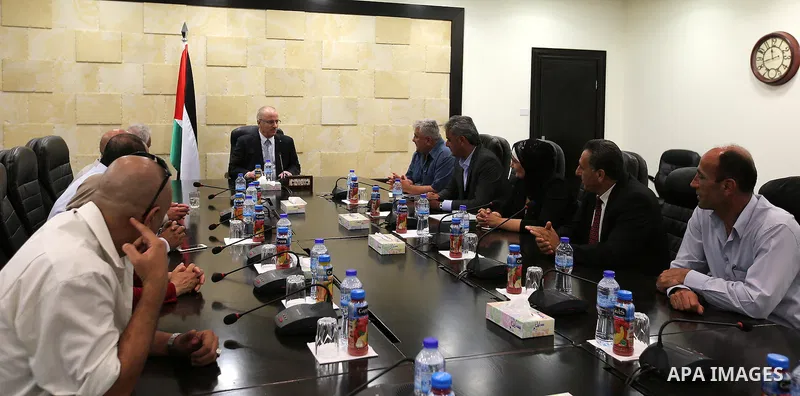 Palestinian Prime Minister, Rami Hamadallah,meets with Fatah members in Jenin province, in the West Bank city of Ramallah, on Aug 8, 2016. Photo by Prime Minister Office