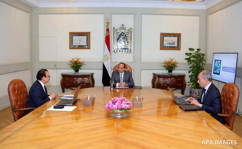 Egyptian President Abdel Fattah al-Sisi meets with Yaseer Qadhi, Minister of Communications and Information Technology, in Cairo, Egypt, on Aug. 08, 2016. Photo by Egyptian President Office