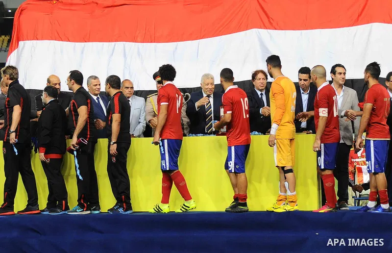 Zamalek players celebrate with the trophy after winning their Egyptian Cup finals derby soccer match against Al Ahly in Borg El-Arab Stadium near Alexandria, Egypt, Aug 8,2016. Photo by Stringer