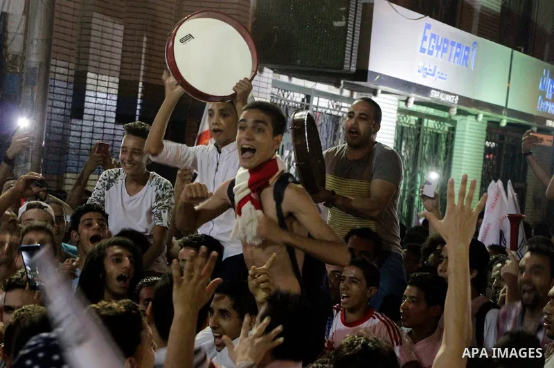 Fans of Zamalek football club celebrate winning the Egypt Cup after Egypt Cup final match against Al Ahli club in Borg El-Arab Stadium near Alexandria, Egypt, Aug 8,2016. Photo by Stringer