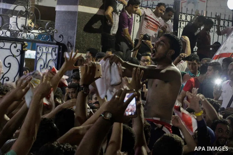 Fans of Zamalek football club celebrate winning the Egypt Cup after Egypt Cup final match against Al Ahli club in Borg El-Arab Stadium near Alexandria, Egypt, Aug 8,2016. Photo by Stringer