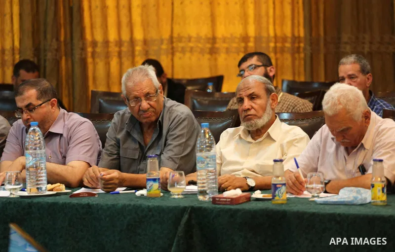 Members of Hamas legislative council attend a meeting in Gaza city, on Aug. 09, 2016. Photo by Mohammed Asad