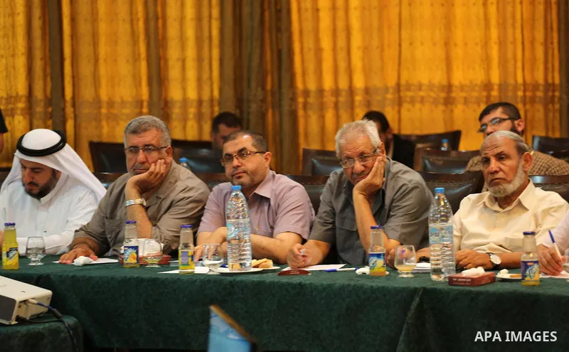 Members of Hamas legislative council attend a meeting in Gaza city, on Aug. 09, 2016. Photo by Mohammed Asad
