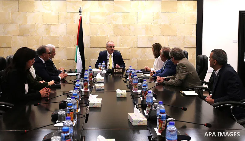 Palestinian Prime Minister, Rami Hamadallah,meets with ILO expert in social security Ursula Kolekih, in the West Bank city of Ramallah, on Aug 9, 2016. Photo by Prime Minister Office