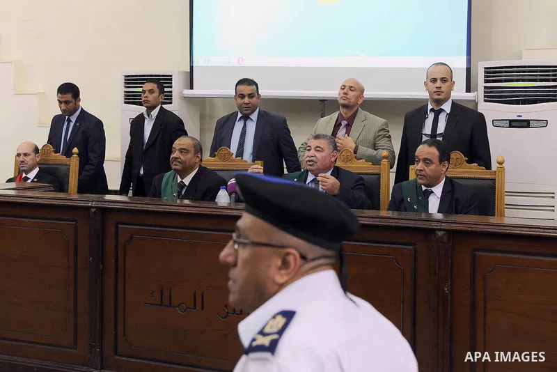 Egyptian judges attend the trial of Egyptian Muslim Brotherhood defendants in a case known in media as "Rabaa Operations Room", in Cairo, on Aug. 09, 2016. Photo by Amr Sayed