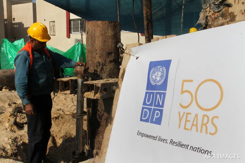 Palestinian workers work at project executed by the United Nations Development Programme (UNDP), in Rafah in the southern Gaza strip, on Aug. 09, 2016. Israel said it had arrested and charged a United Nations employee fo...