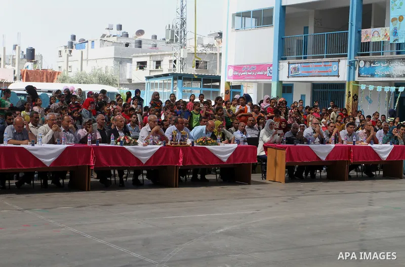 Palestinian schoolgirls take part in the closing ceremony of 2016 summer fun week organised by the United Nations Relief and Works Agency (UNRWA), in Rafah in the southern Gaza strip, on August 10, 2016. Photo by Abed Ra...