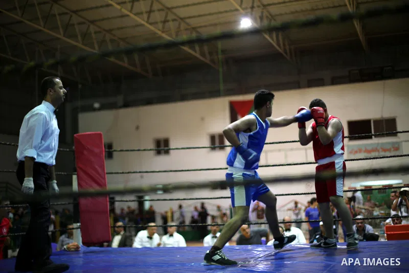 Palestinian players participate in a boxing match of the late Muhammad Ali in Gaza city, on August 12, 2016. Photo by Mohammed Asad
