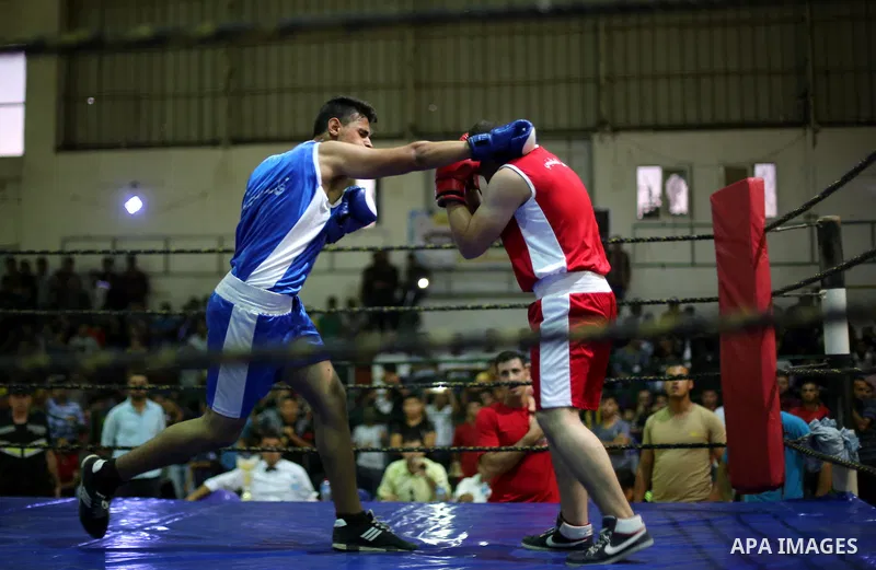 Palestinian players participate in a boxing match of the late Muhammad Ali in Gaza city, on August 12, 2016. Photo by Mohammed Asad