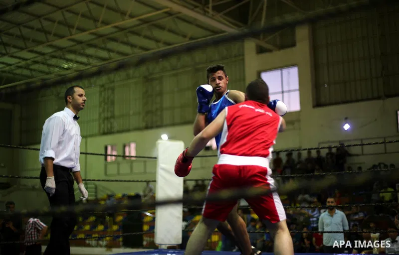Palestinian players participate in a boxing match of the late Muhammad Ali in Gaza city, on August 12, 2016. Photo by Mohammed Asad