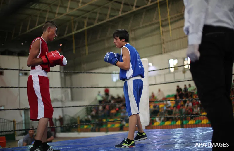 Palestinian players participate in a boxing match of the late Muhammad Ali in Gaza city, on August 12, 2016. Photo by Mohammed Asad