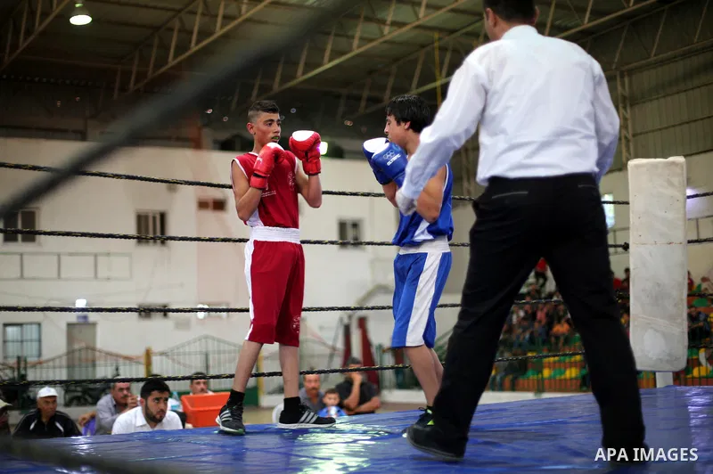 Palestinian players participate in a boxing match of the late Muhammad Ali in Gaza city, on August 12, 2016. Photo by Mohammed Asad