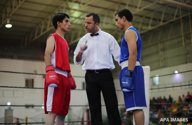 Palestinian players participate in a boxing match of the late Muhammad Ali in Gaza city, on August 12, 2016. Photo by Mohammed Asad