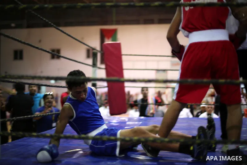 Palestinian players participate in a boxing match of the late Muhammad Ali in Gaza city, on August 12, 2016. Photo by Mohammed Asad