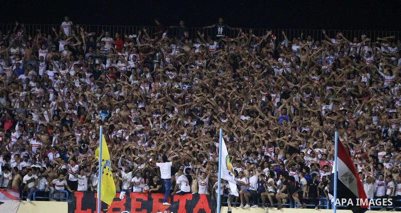 Egypts Zamalek fans cheer during the African Champions League football match between Egypts Zamalek and Nigerias Enyimba FC at Petro Sport stadium in Cairo on August 15, 2016. Photo by Stringer