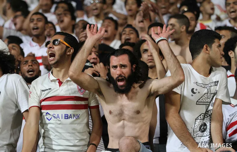Egypts Zamalek fans cheer during the African Champions League football match between Egypts Zamalek and Nigerias Enyimba FC at Petro Sport stadium in Cairo on August 15, 2016. Photo by Stringer