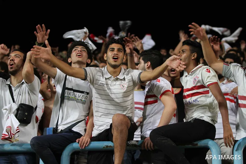 Egypts Zamalek fans cheer during the African Champions League football match between Egypts Zamalek and Nigerias Enyimba FC at Petro Sport stadium in Cairo on August 15, 2016. Photo by Stringer