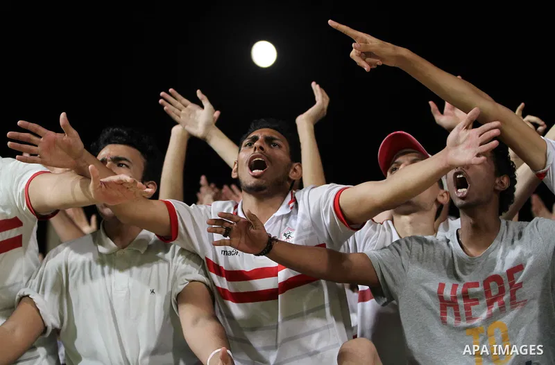 Egypts Zamalek fans cheer during the African Champions League football match between Egypts Zamalek and Nigerias Enyimba FC at Petro Sport stadium in Cairo on August 15, 2016. Photo by Stringer