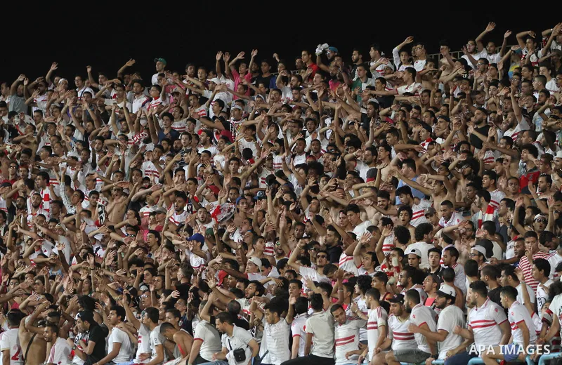 Egypts Zamalek fans cheer during the African Champions League football match between Egypts Zamalek and Nigerias Enyimba FC at Petro Sport stadium in Cairo on August 15, 2016. Photo by Stringer