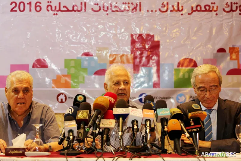 Palestinian Central Commission chief, Hanna Nasser speaks during a press conference in Gaza city, on Aug. 16, 2016. Photo by Mohammed Asad