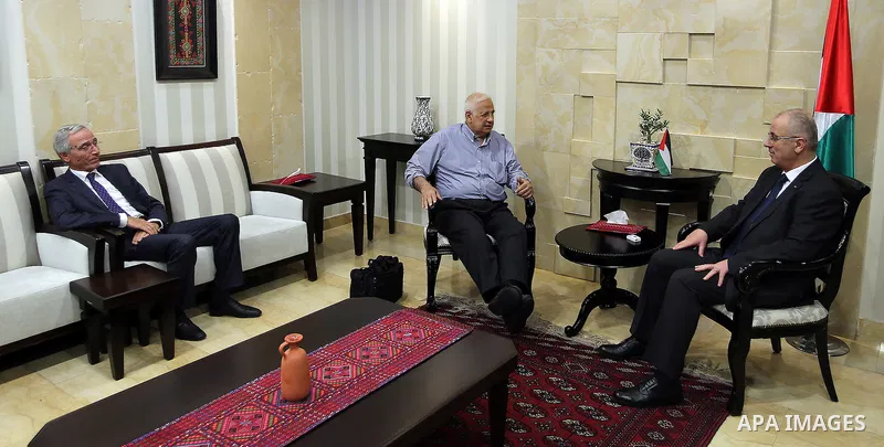 Palestinian Prime Minister Rami Hamdallah meets with Palestinian Central Commission chief, Hanna Nasser in the West Bank city of Ramallah, on Aug. 17, 2016. Photo by Prime Minister Office