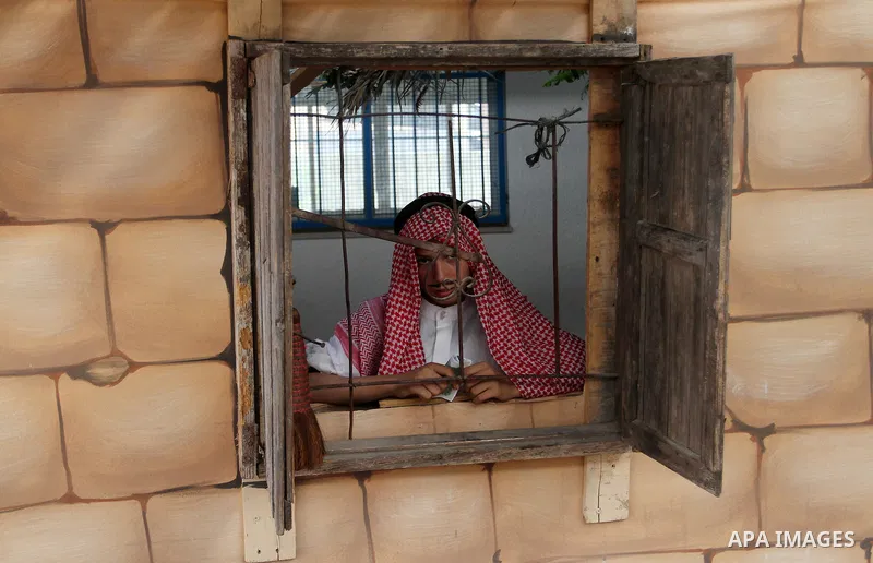 Palestinians take part in heritage festival during the closing ceremony of 2016 summer fun week organised by the United Nations Relief and Works Agency (UNRWA), in Khan Younis in the southern Gaza strip, on August 17, 20...