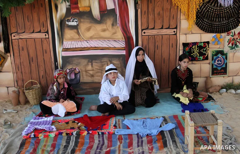 Palestinians take part in heritage festival during the closing ceremony of 2016 summer fun week organised by the United Nations Relief and Works Agency (UNRWA), in Khan Younis in the southern Gaza strip, on August 17, 20...