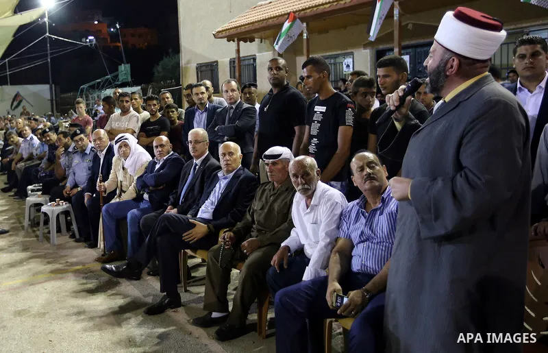 Palestininan Prime Minister, Rami Hamdallah, attends the funeral of the martyr Shibley Bani Shamsa and Mahmoud Altaraireh, in the West Bank, City of Nablus on August 20, 2016. Photo by Prime Minister Office