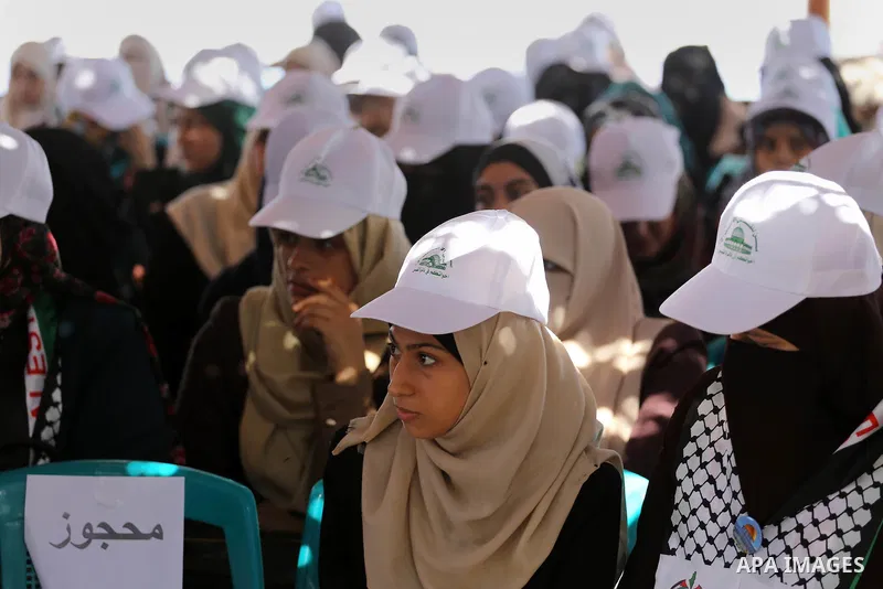 Palestinian women attend the opening of the Jerusalem Committee camps ceremony, in Gaza city, on August 21, 2016. Photo by Mohammed Asad