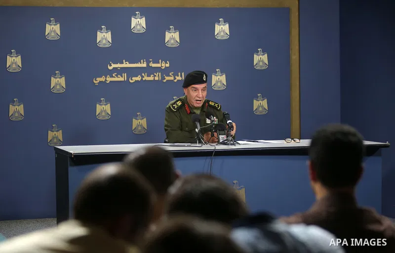 A spokesman for the security services, Major General, Adnan Al-damiri, speaks during a press conference, in the West bank city of Ramallah, on August 21, 2016. Photo by Shadi Hatem