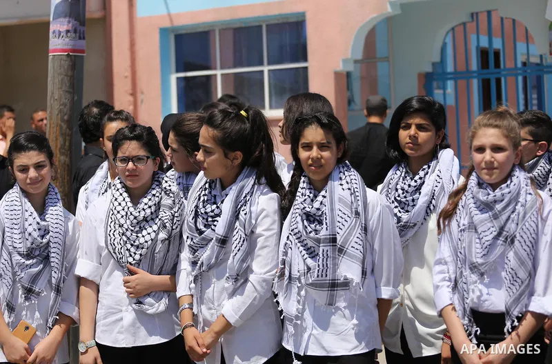 Palestinian band Sanawnaw, who were denied access to perform the festival at Bethlehem, take part in a protest against the denial in Beit Hanun, near the Erez crossing point with Israel, in the northern Gaza Strip on Aug...