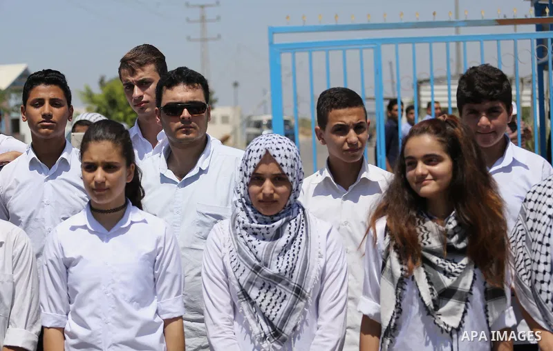 Palestinian band Sanawnaw, who were denied access to perform the festival at Bethlehem, take part in a protest against the denial in Beit Hanun, near the Erez crossing point with Israel, in the northern Gaza Strip on Aug...