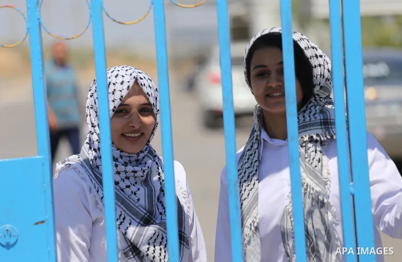 Palestinian band Sanawnaw, who were denied access to perform the festival at Bethlehem, take part in a protest against the denial in Beit Hanun, near the Erez crossing point with Israel, in the northern Gaza Strip on Aug...