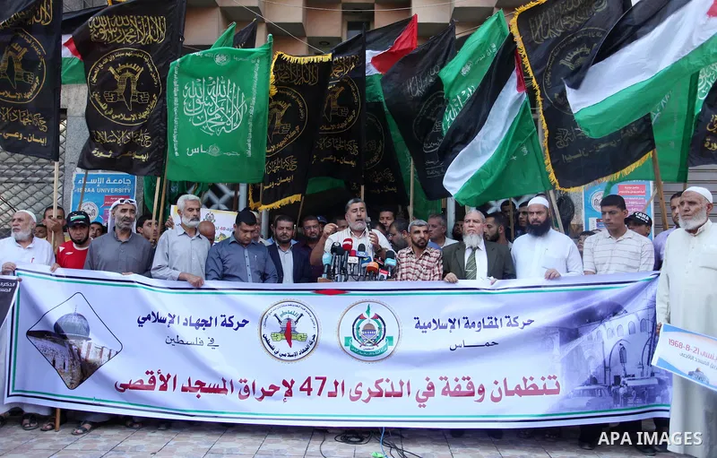 Palestinians take part during a protest to mark the 47th anniversary of the burning of Al-Aqsa Mosque, in Gaza city on Aug. 21, 2016. Photo by Ashraf Amra
