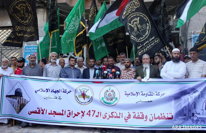 Palestinians take part during a protest to mark the 47th anniversary of the burning of Al-Aqsa Mosque, in Gaza city on Aug. 21, 2016. Photo by Ashraf Amra