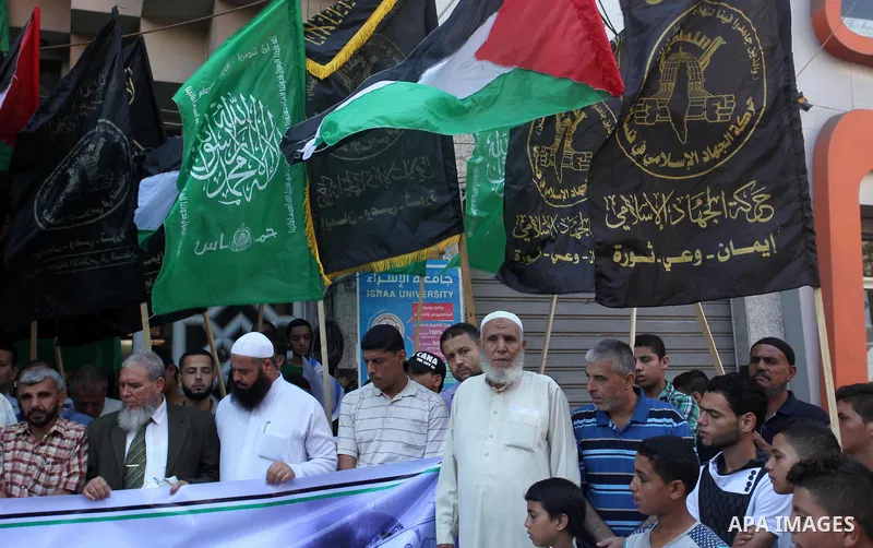 Palestinians take part during a protest to mark the 47th anniversary of the burning of Al-Aqsa Mosque, in Gaza city on Aug. 21, 2016. Photo by Ashraf Amra