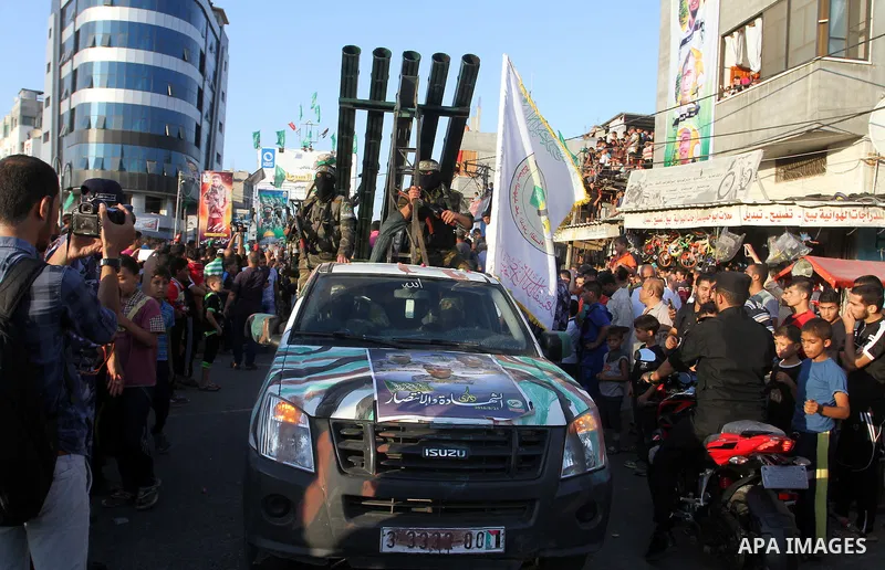 Palestinian members of al-Qassam Brigades, the armed wing of the Hamas movement, take part during an anti-Israel military parade, in Rafah in the southern Gaza Strip August 21, 2016. Photo by Abed Rahim Khatib