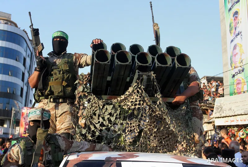 Palestinian members of al-Qassam Brigades, the armed wing of the Hamas movement, take part during an anti-Israel military parade, in Rafah in the southern Gaza Strip August 21, 2016. Photo by Abed Rahim Khatib