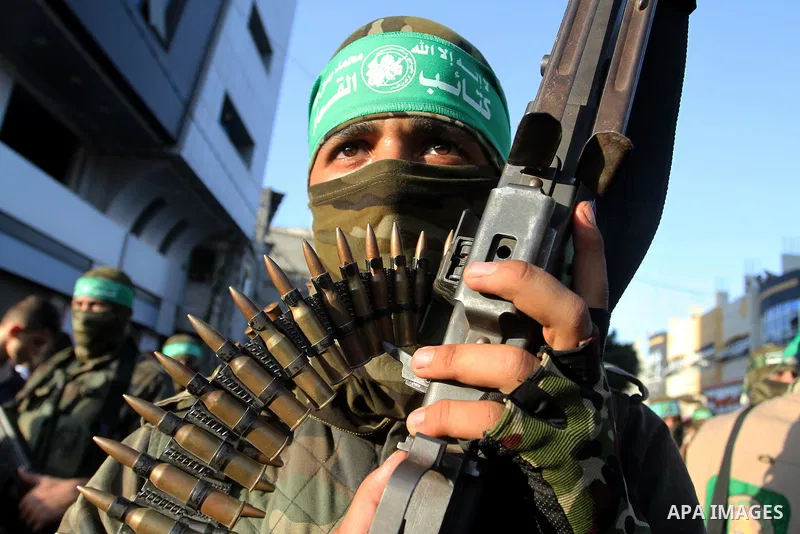 Palestinian members of al-Qassam Brigades, the armed wing of the Hamas movement, take part during an anti-Israel military parade, in Rafah in the southern Gaza Strip August 21, 2016. Photo by Abed Rahim Khatib