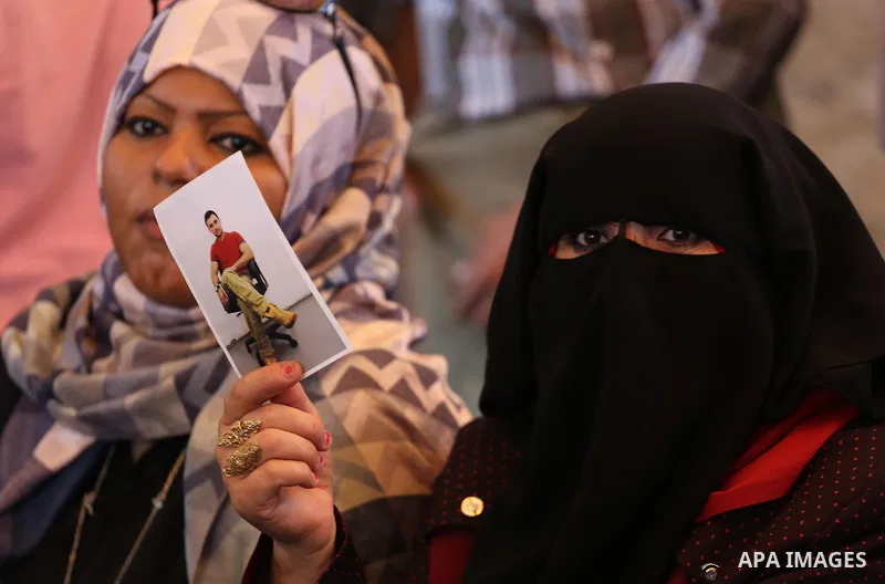 Palestinians take part in a protest demanding release the prisoners in Israeli jails, in front of Red cross office in Gaza city, on August 22, 2016. Photo by Mohammed Asad