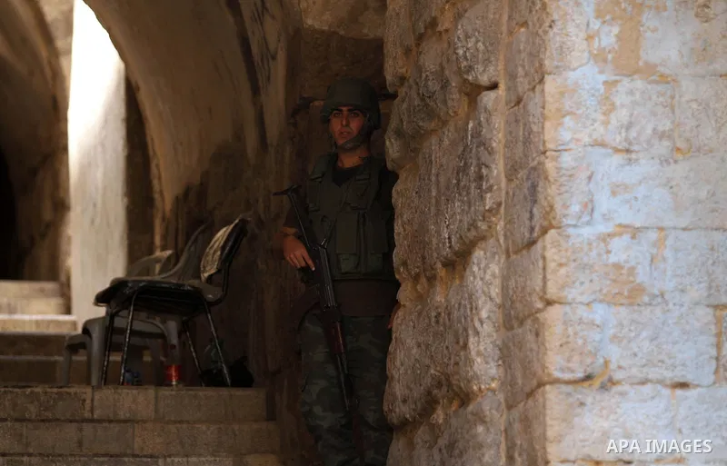 Members of the Palestinian security forces patrol in the West Bank city of Nablus on August 22, 2016 during ongoing clashes between the security forces and Palestinian gunmen. Palestinian security forces detained two Nab...