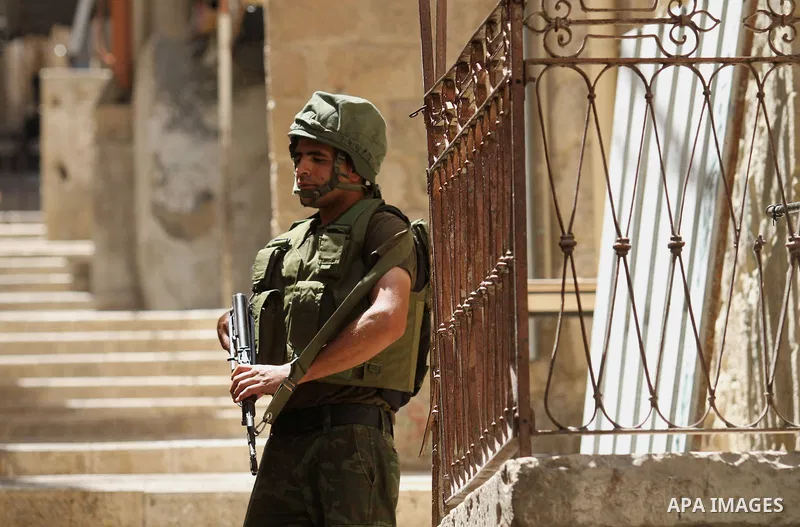 Members of the Palestinian security forces patrol in the West Bank city of Nablus on August 22, 2016 during ongoing clashes between the security forces and Palestinian gunmen. Palestinian security forces detained two Nab...
