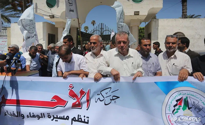 Palestinians take part during a protest to mark the 47th anniversary of the burning of Al-Aqsa Mosque, in Gaza city on Aug. 23, 2016. Photo by Mohammed Asad