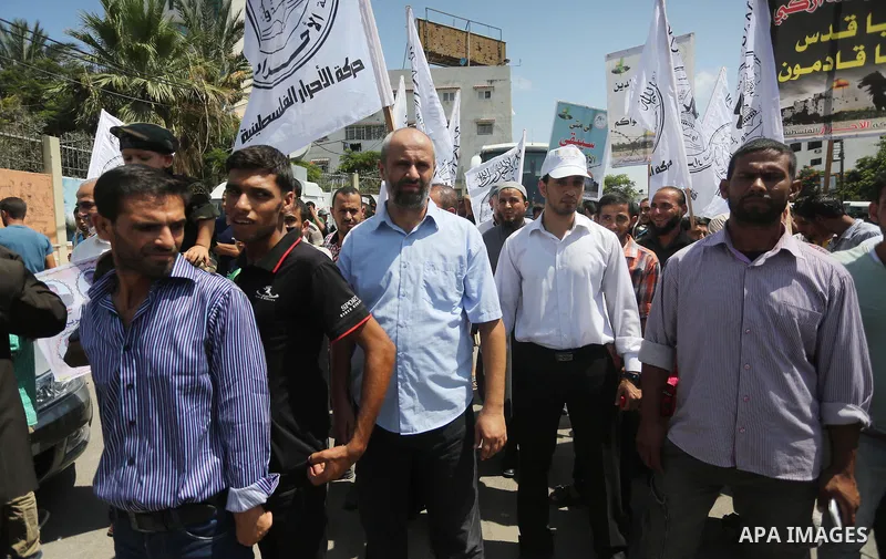 Palestinians take part during a protest to mark the 47th anniversary of the burning of Al-Aqsa Mosque, in Gaza city on Aug. 23, 2016. Photo by Mohammed Asad