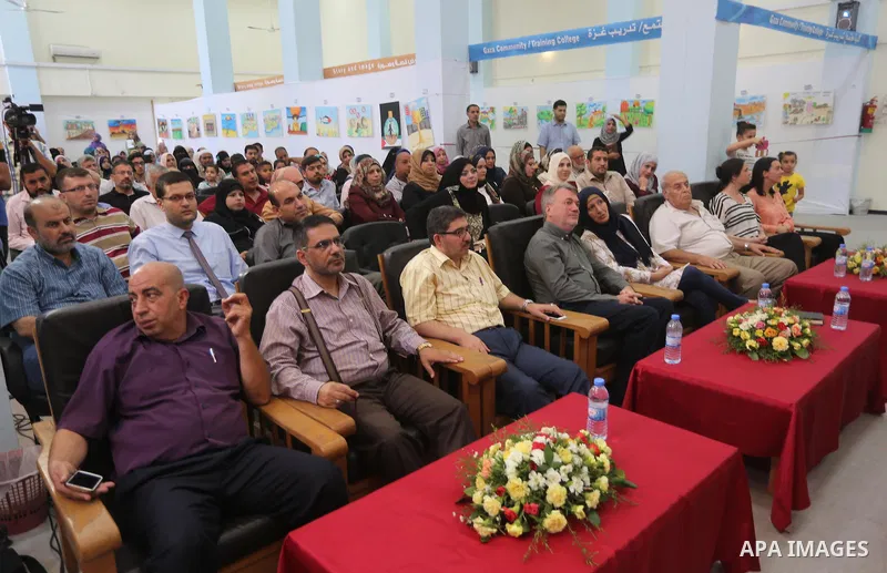 Director of UNRWA operations in Gaza Bo Shack attends the art exhibition "draw your dream for Gaza 2020", in Gaza city on Aug. 23, 2016. Photo by Mohammed Asad